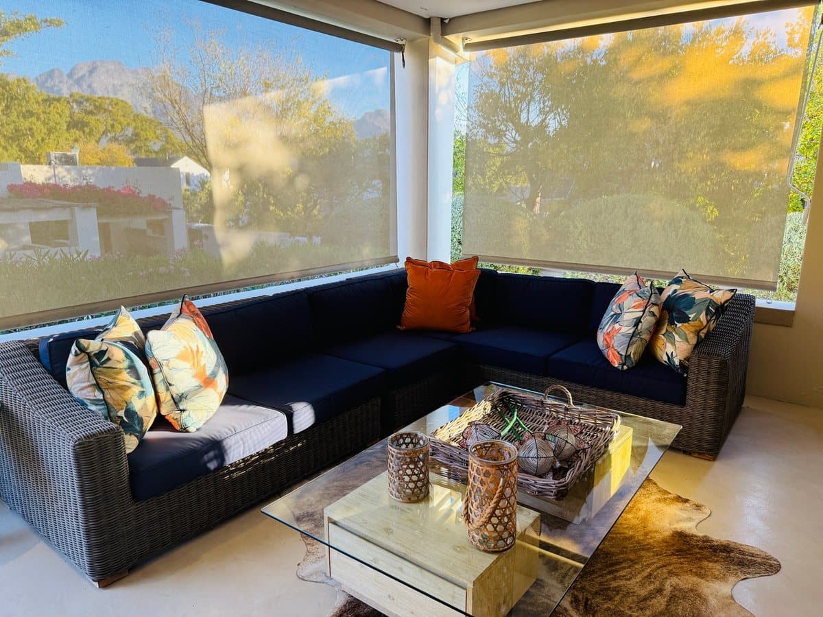The covered patio lounge with mountain views